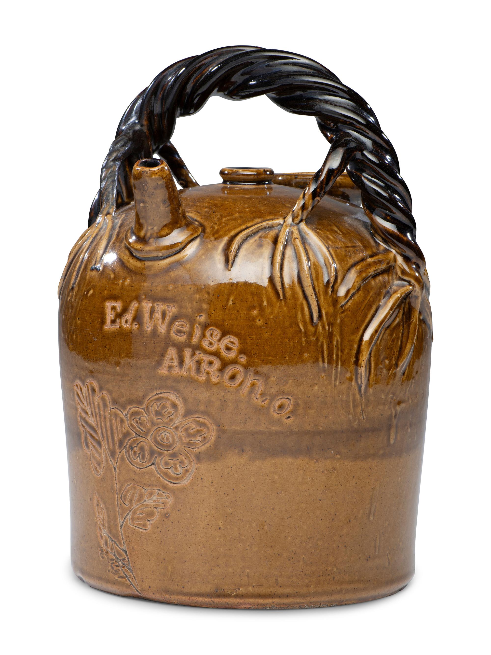 A Rhodenbaugh Stoneware Harvest Jug