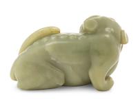 A Chinese Green Jade Figure of a Mythical Beast — 20TH CENTURY