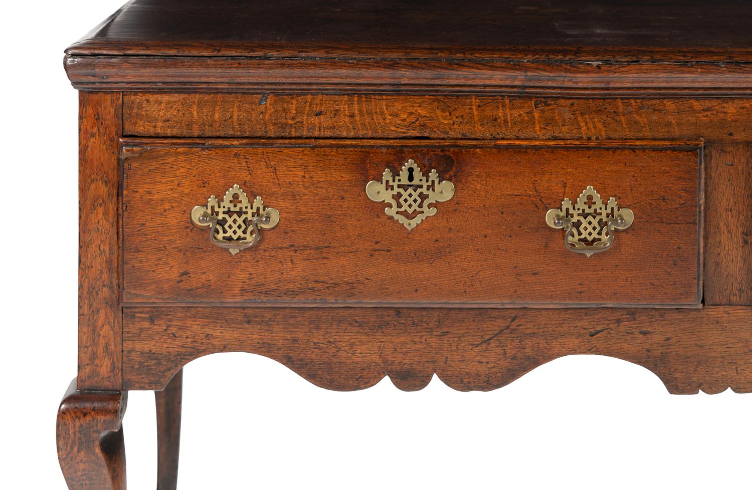 A Provincial Queen Anne Carved Oak Welsh Dresser