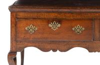 A Provincial Queen Anne Carved Oak Welsh Dresser