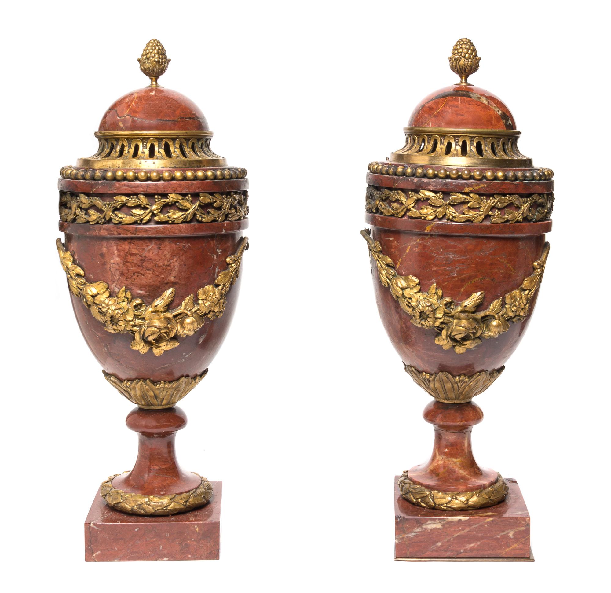 A Pair of Neoclassical Rouge Marble and Gilt Bronze Mounted Urns, Height 17 1/4 inches.