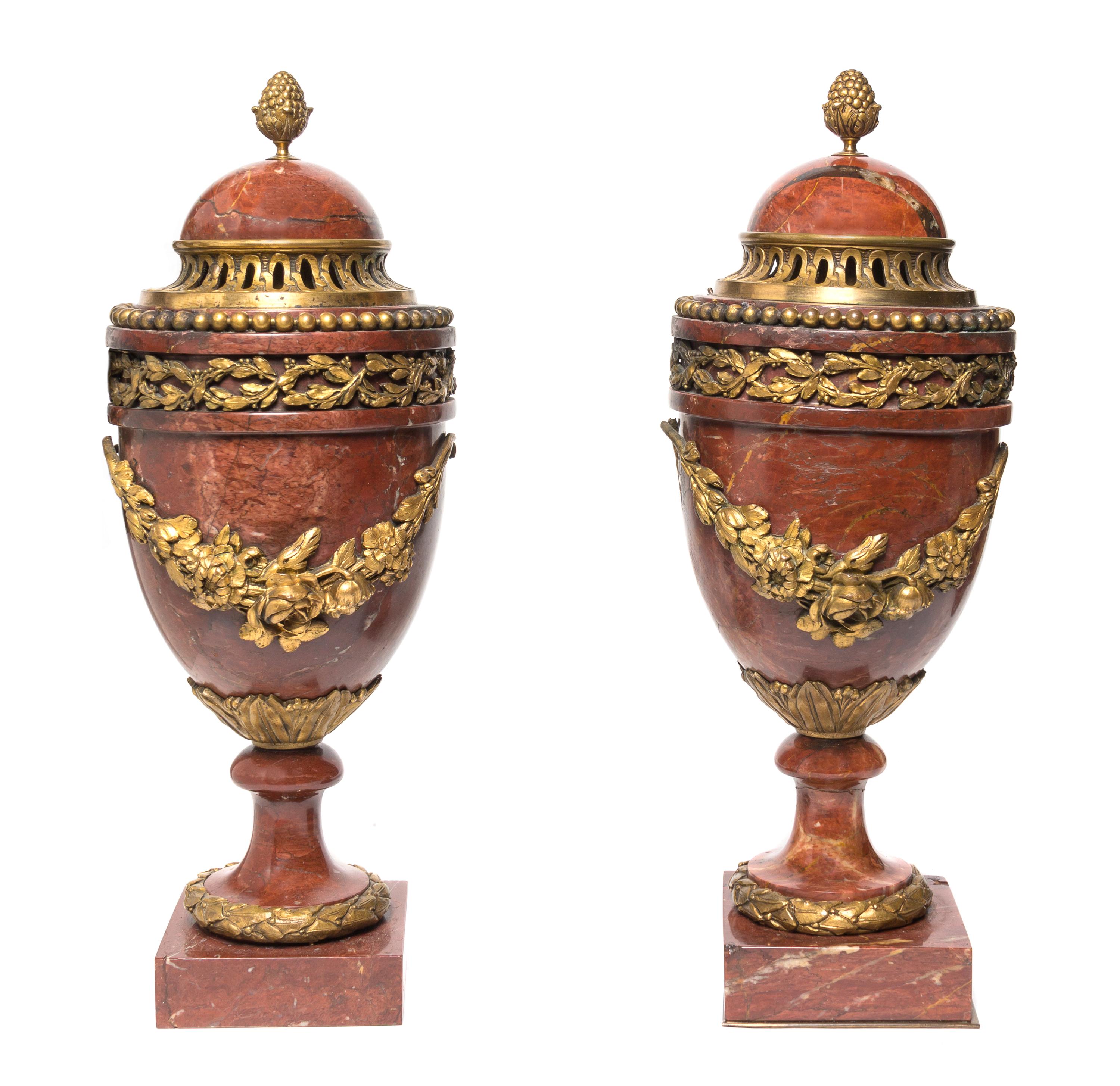 A Pair of Neoclassical Rouge Marble and Gilt Bronze Mounted Urns, Height 17 1/4 inches.