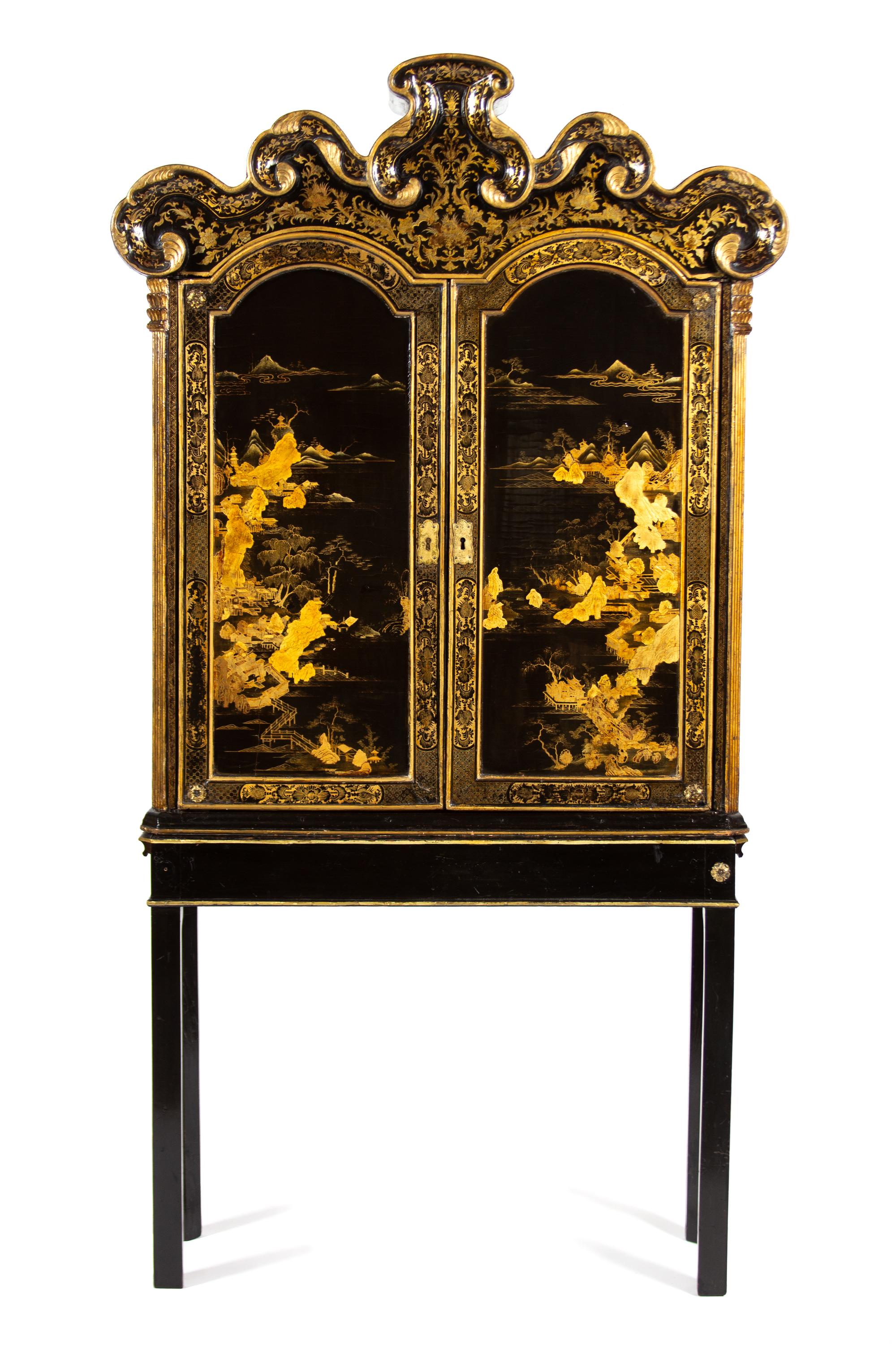 A Chinese Black and Gilt Lacquer Cabinet Height 81 3/4 x width 42 1/2 x depth 13 inches. — 18TH CENTURY