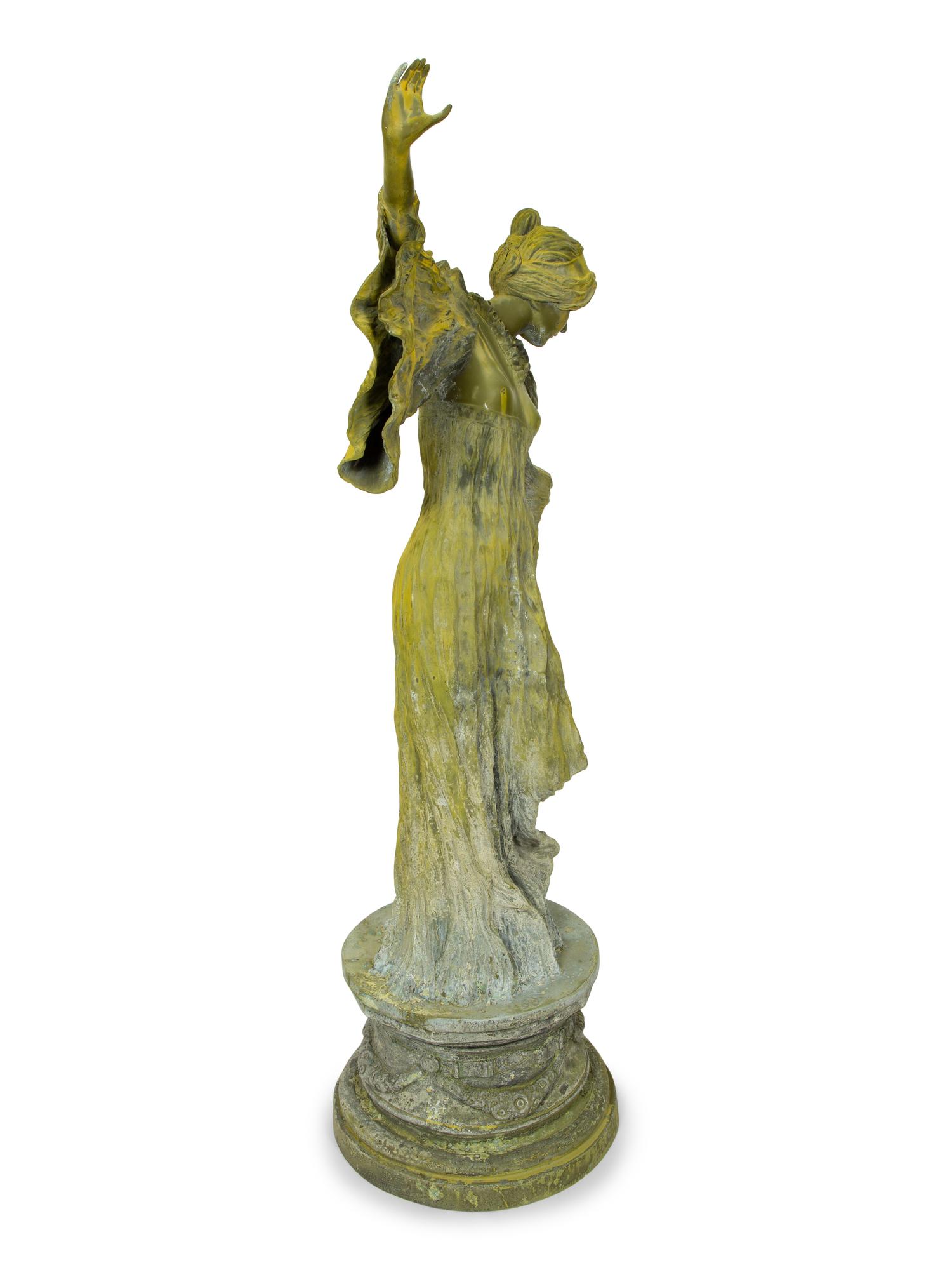 An Art Nouveau Patinated Bronze Figure of Woman is Flowing Dress — 19TH/20TH CENTURY
