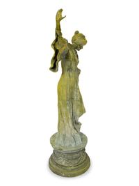 An Art Nouveau Patinated Bronze Figure of Woman is Flowing Dress — 19TH/20TH CENTURY