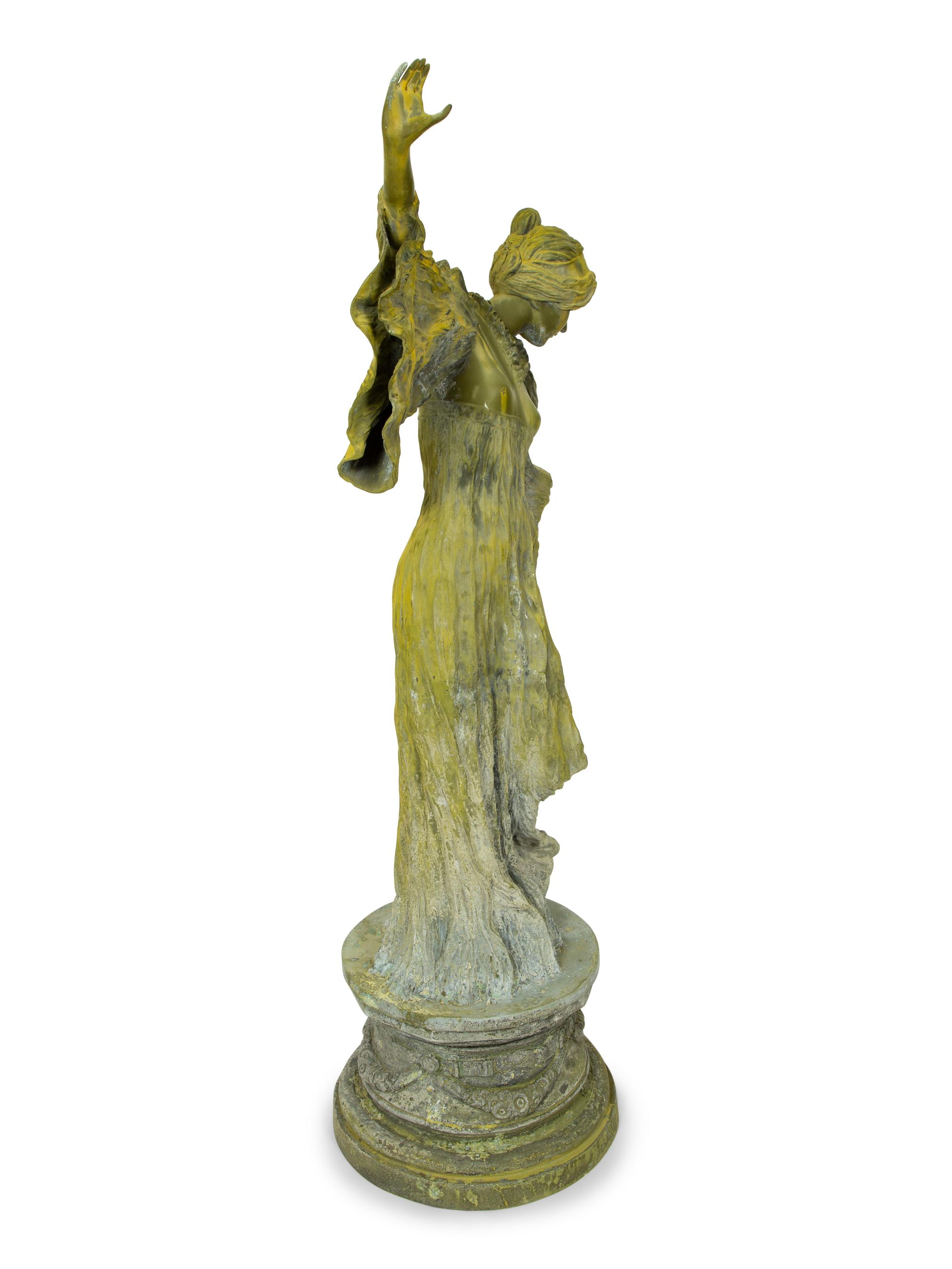 An Art Nouveau Patinated Bronze Figure of Woman is Flowing Dress — 19TH/20TH CENTURY