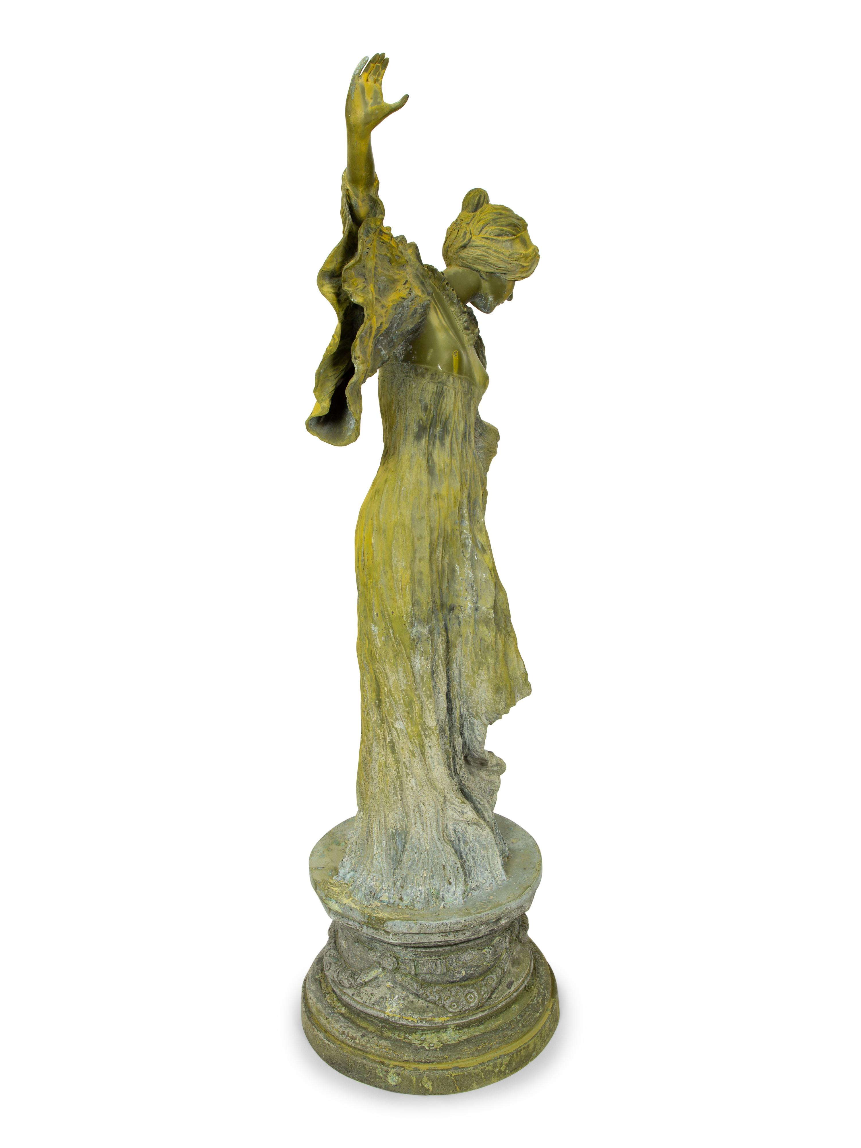 An Art Nouveau Patinated Bronze Figure of Woman is Flowing Dress — 19TH/20TH CENTURY