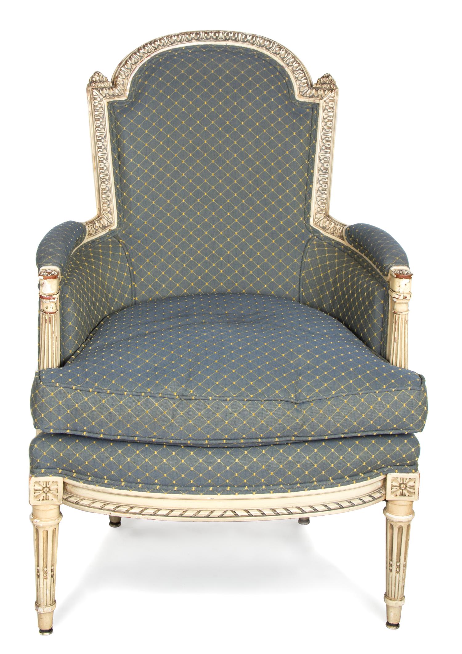 A Louis XVI Style Carved and Painted Wood Bergere Height 36 inches. — 19TH CENTURY