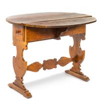 An Italian Walnut Drop-Leaf Table Height 32 x width 43 x depth 15 1/4 inches (closed). — 18TH CENTURY