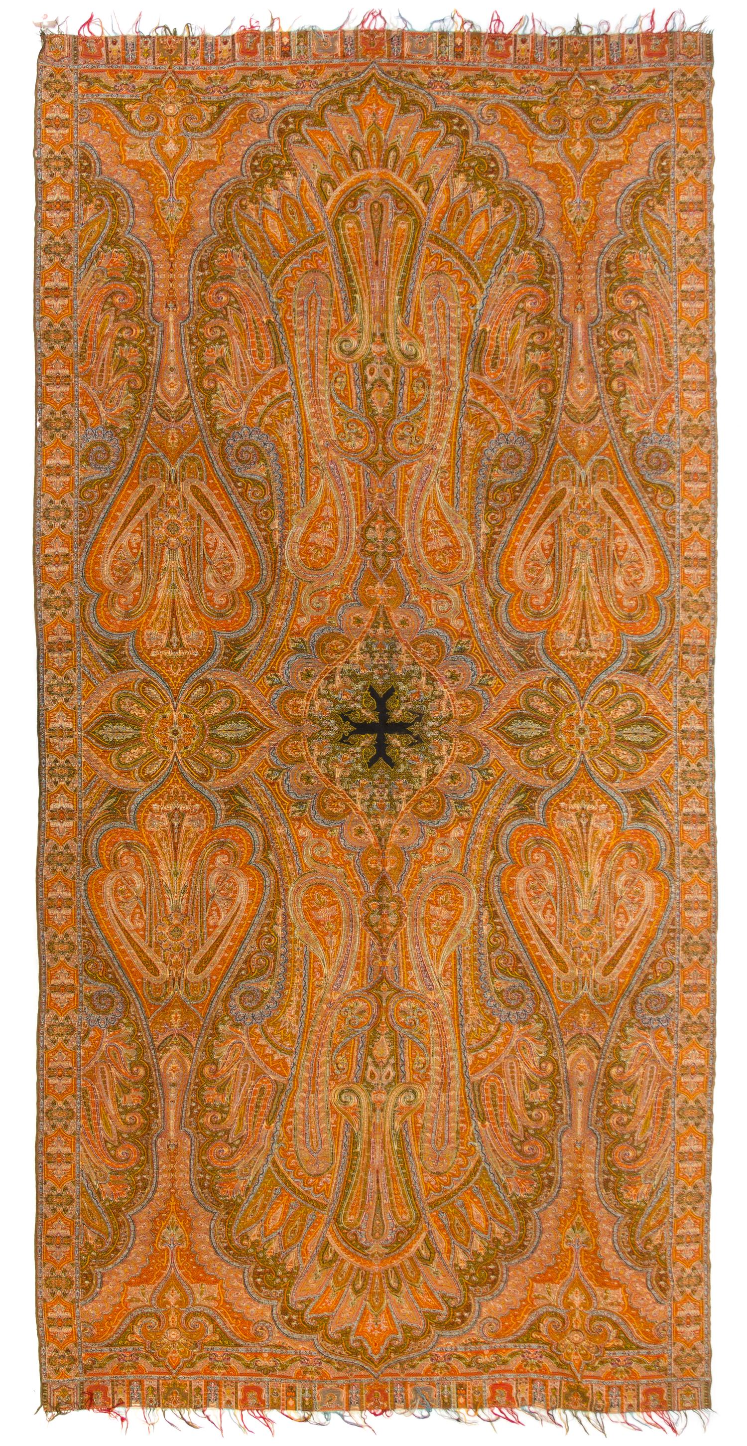 An English Wool Paisley Shawl 125 x 62 3/4 inches.