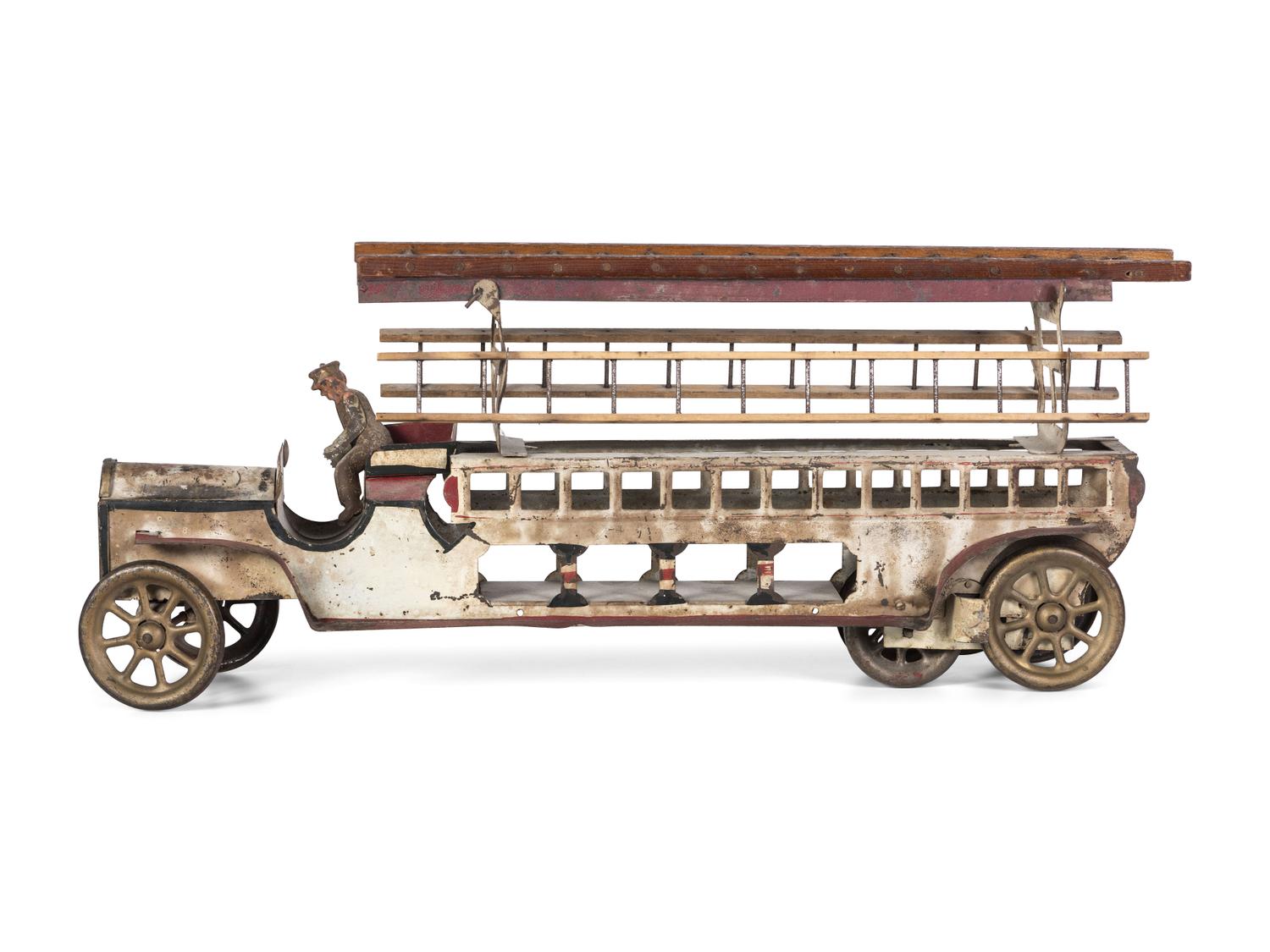 Two Pressed Steel and Tin Toy Fire Trucks