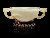 A Chinese Carved White Jade 'Chilong' Handled Cup, 19th/Early 20th Century 晚清/民國 白玉螭龍雙耳杯