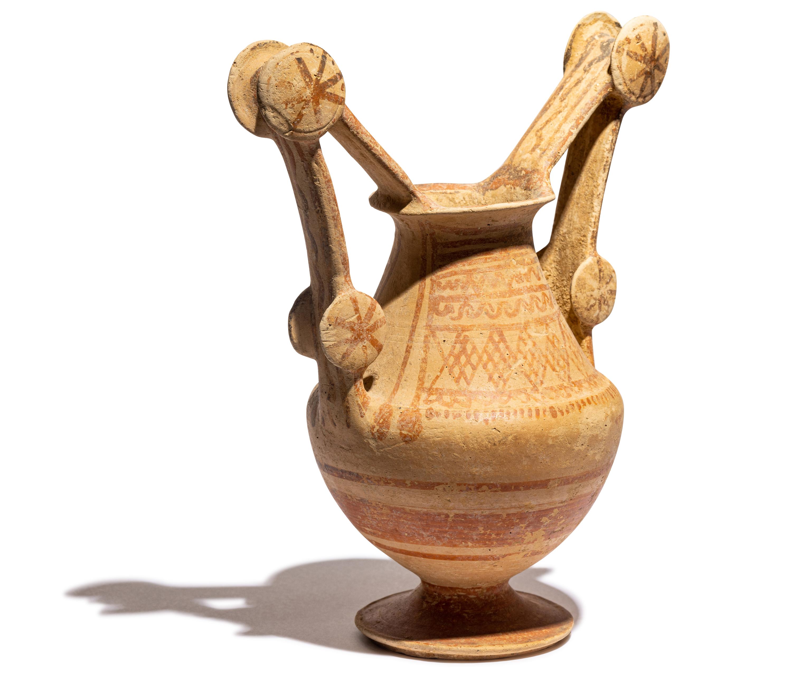 A Mesapian Painted Pottery Trozella
