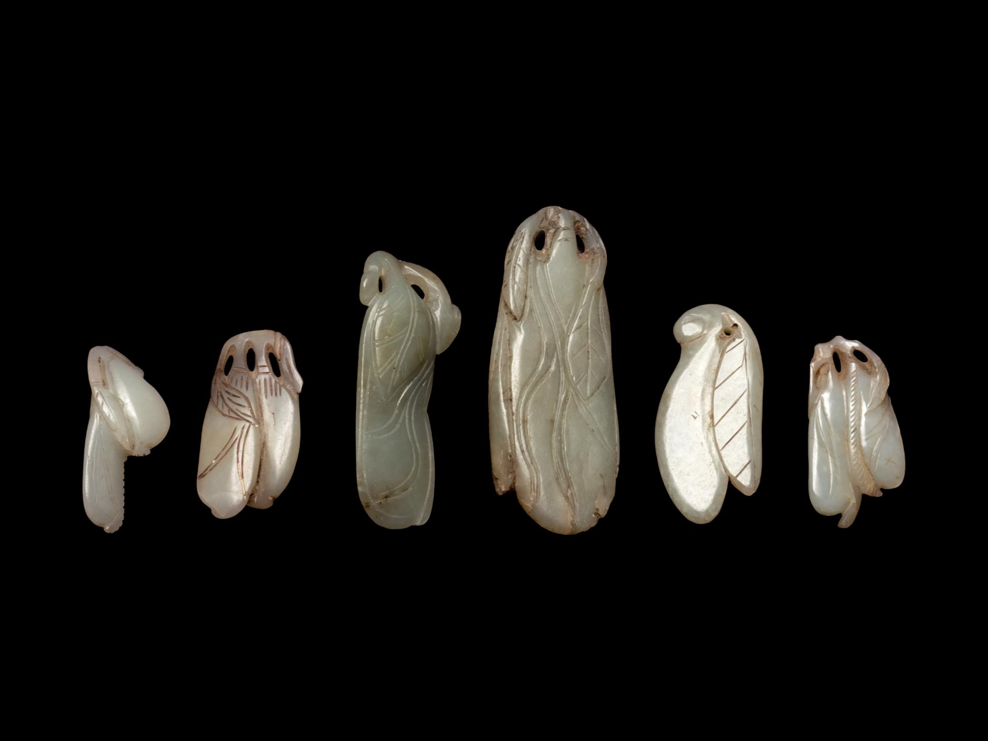 Six Chinese Carved Jade Beans