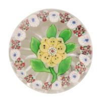 A Baccarat Spotted Yellow Wheatflower and Millefiori Garland Glass Paperweight