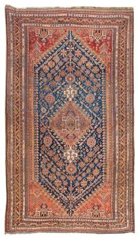 A Qashqai Wool Rug 10 feet 1 inch x 6 feet 3 inches. — CIRCA 1900