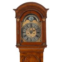 A Dutch Walnut Tall Case Clock