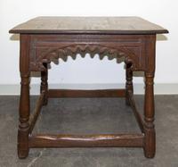 A Gothic Revival Oak Center Table Height 30 1/4 x width 36 x depth 36 inches. — EARLY 20TH CENTURY