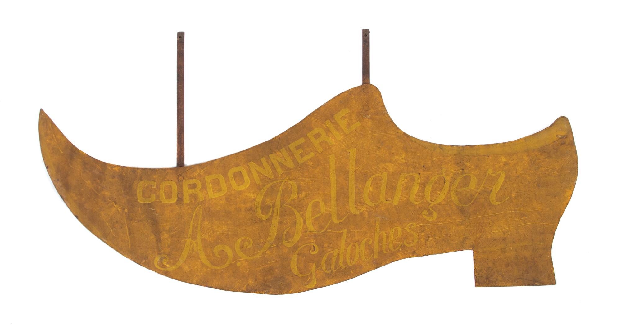 A French Yellow-Painted Sheet Metal Shoe Sign