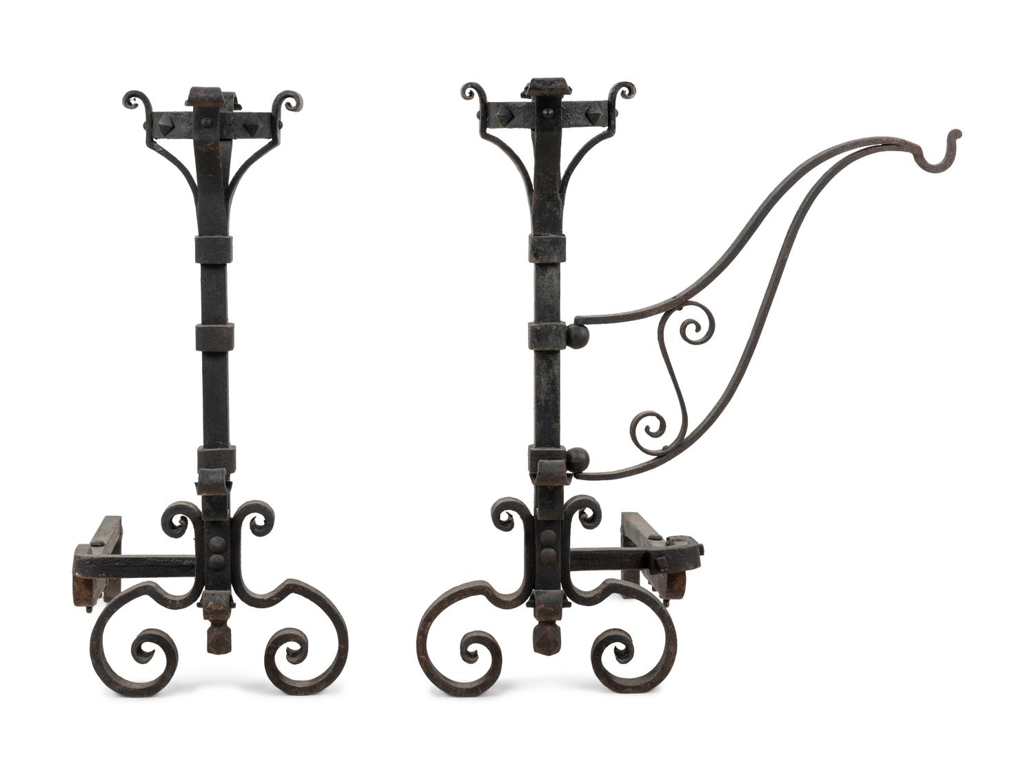 A Pair of Continental Iron Andirons with Posset Cup Holders
