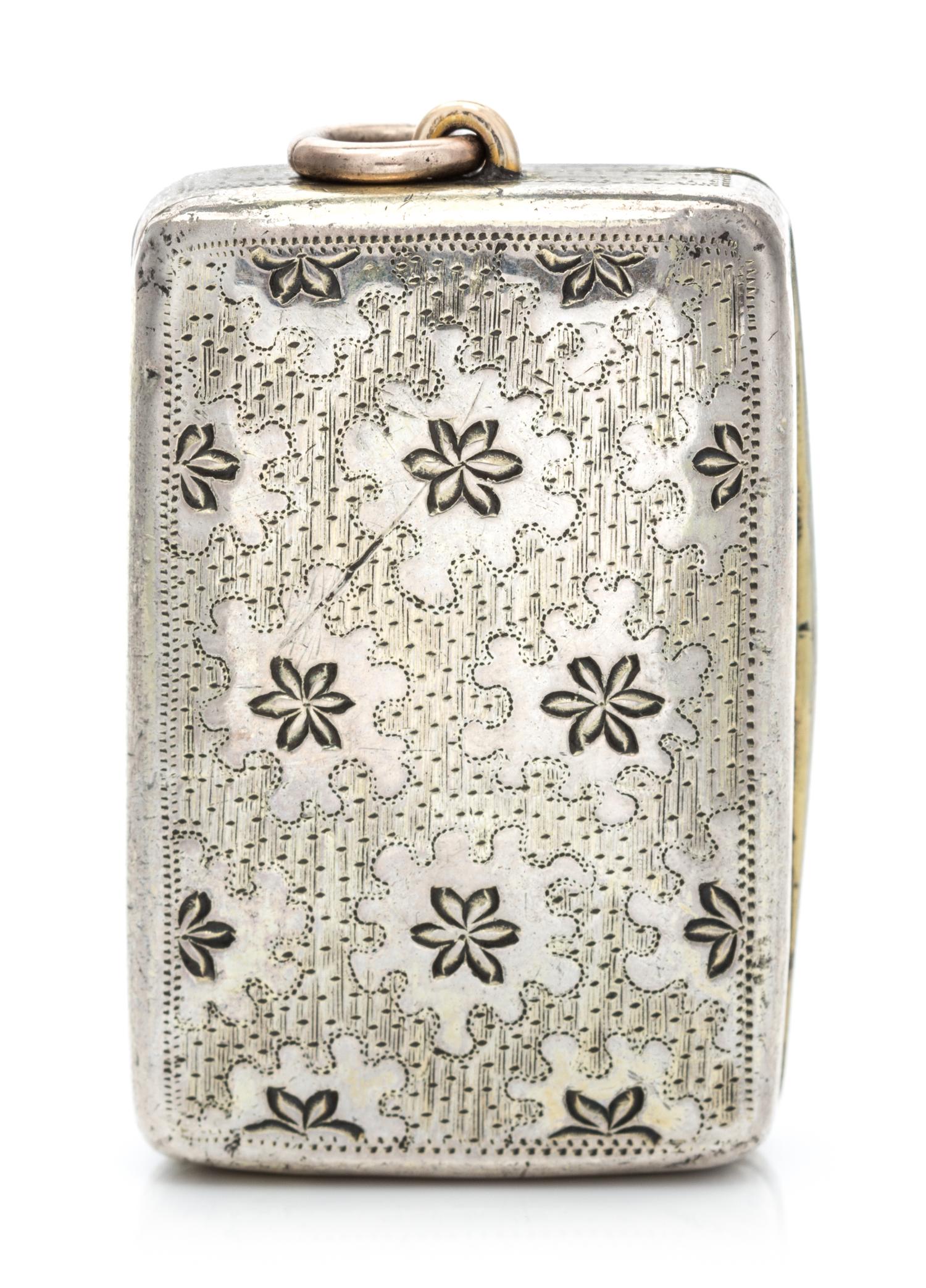 A George III Silver Vinaigrette, Thomas Phipps & Edward Robinson, London, 1786, the case worked with foliate decoration.
