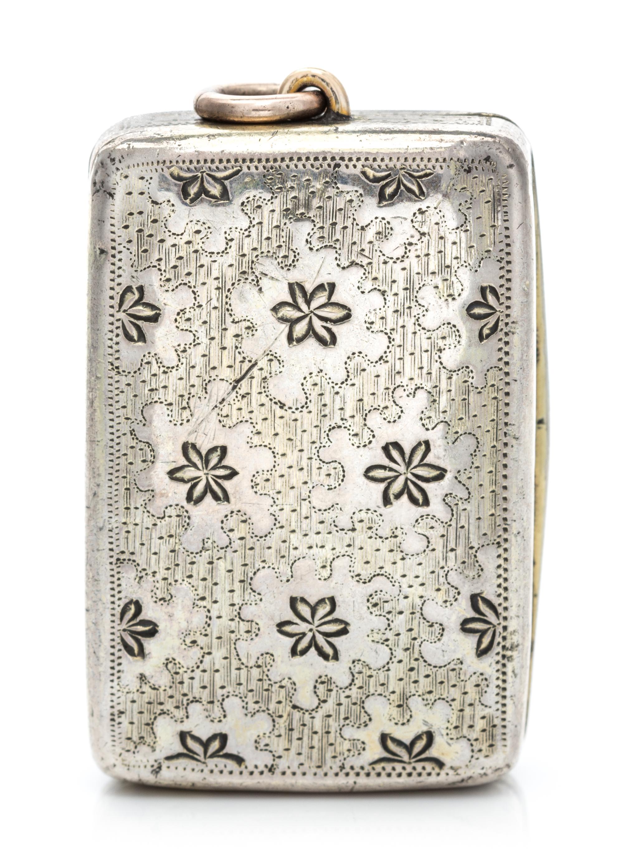 A George III Silver Vinaigrette, Thomas Phipps & Edward Robinson, London, 1786, the case worked with foliate decoration.
