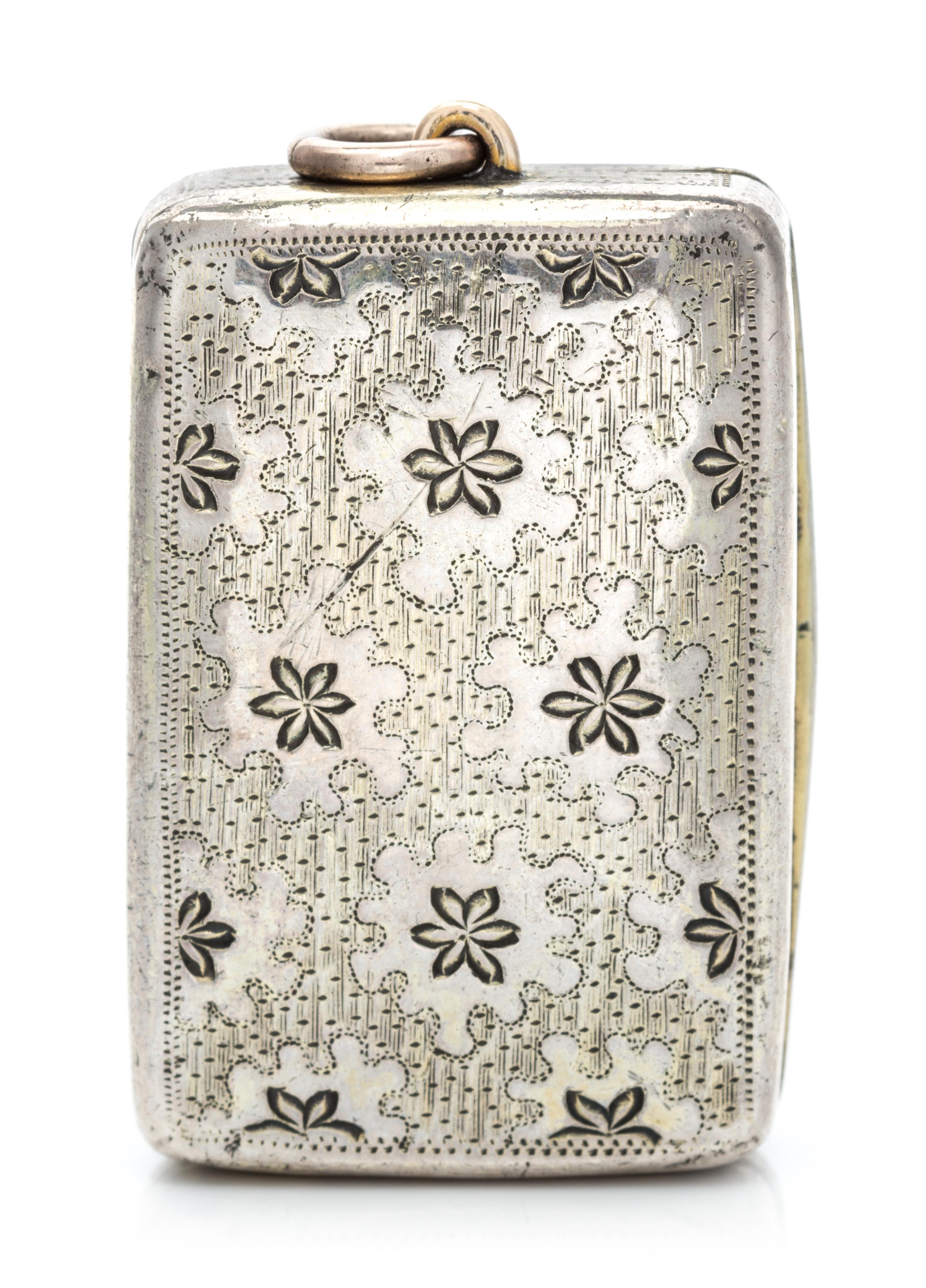 A George III Silver Vinaigrette, Thomas Phipps & Edward Robinson, London, 1786, the case worked with foliate decoration.