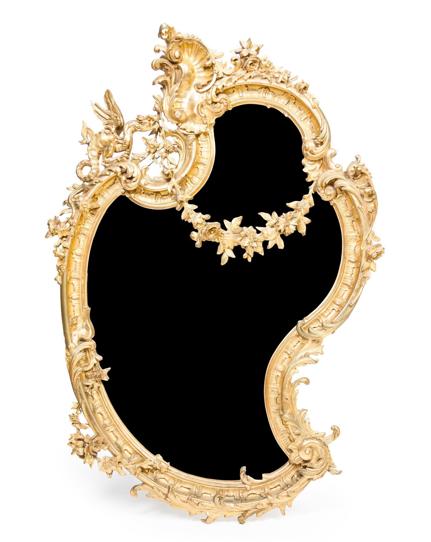 A Rococo Style Giltwood Mirror Height 51 1/2 x width 33 1/4 inches. — 19TH CENTURY