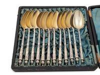 A Set of Twelve French Silver Teaspoons and a Set of Six Danish Silver and Enamel Demitasse Spoons