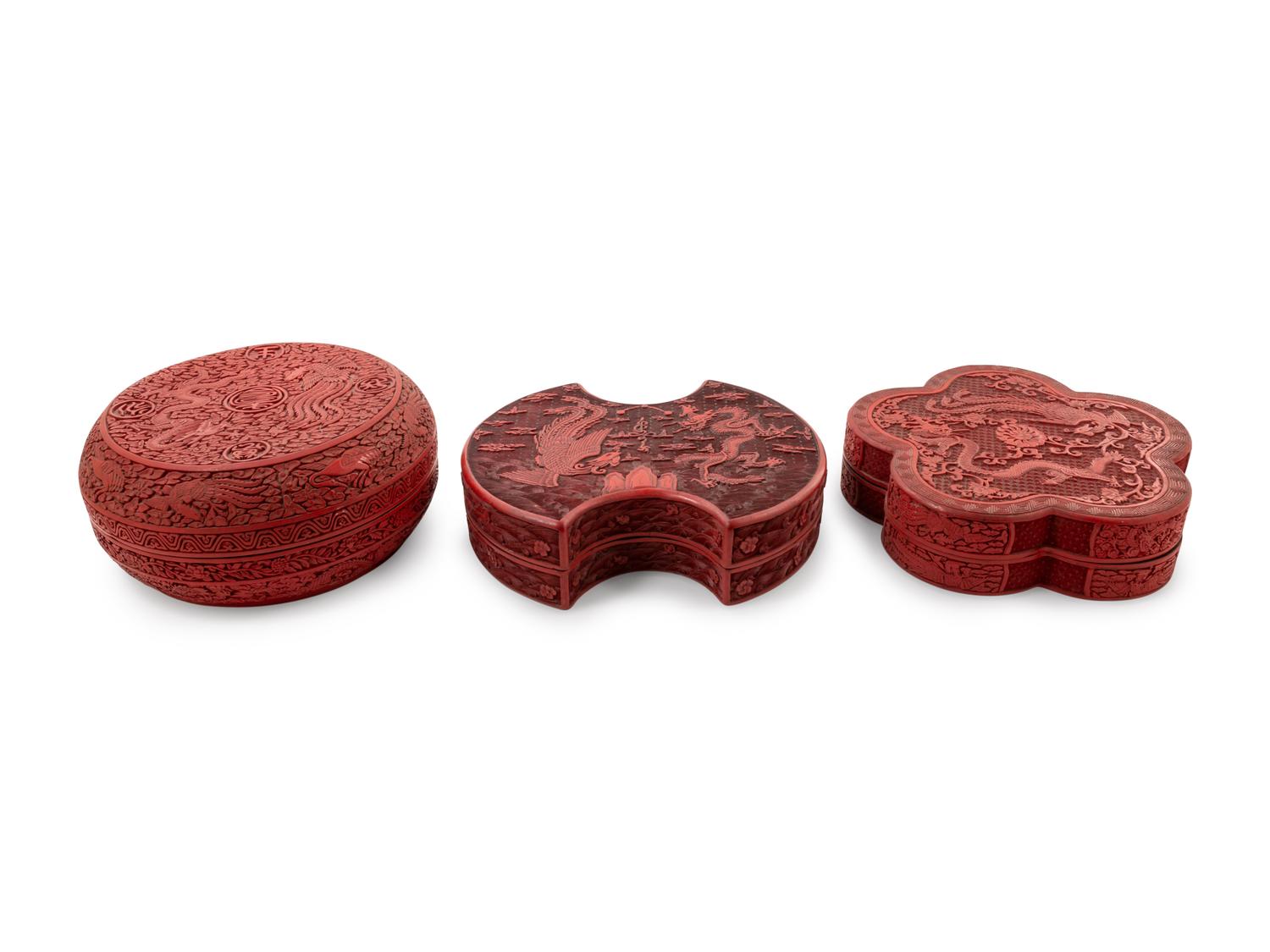 Three Large Chinese Carved Red Lacquer Covered Boxes