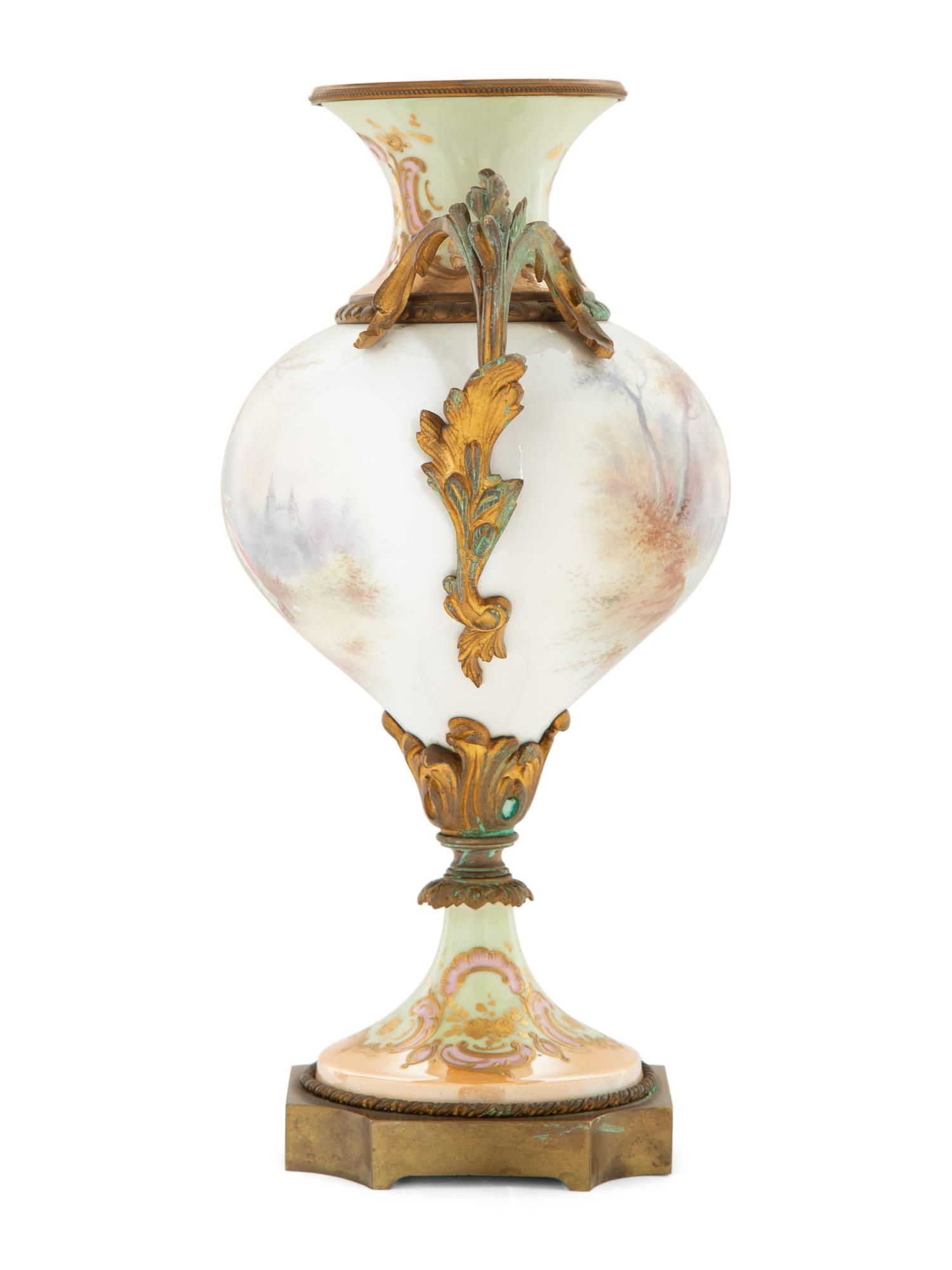 A Gilt Bronze Mounted Sèvres Style Porcelain Urn