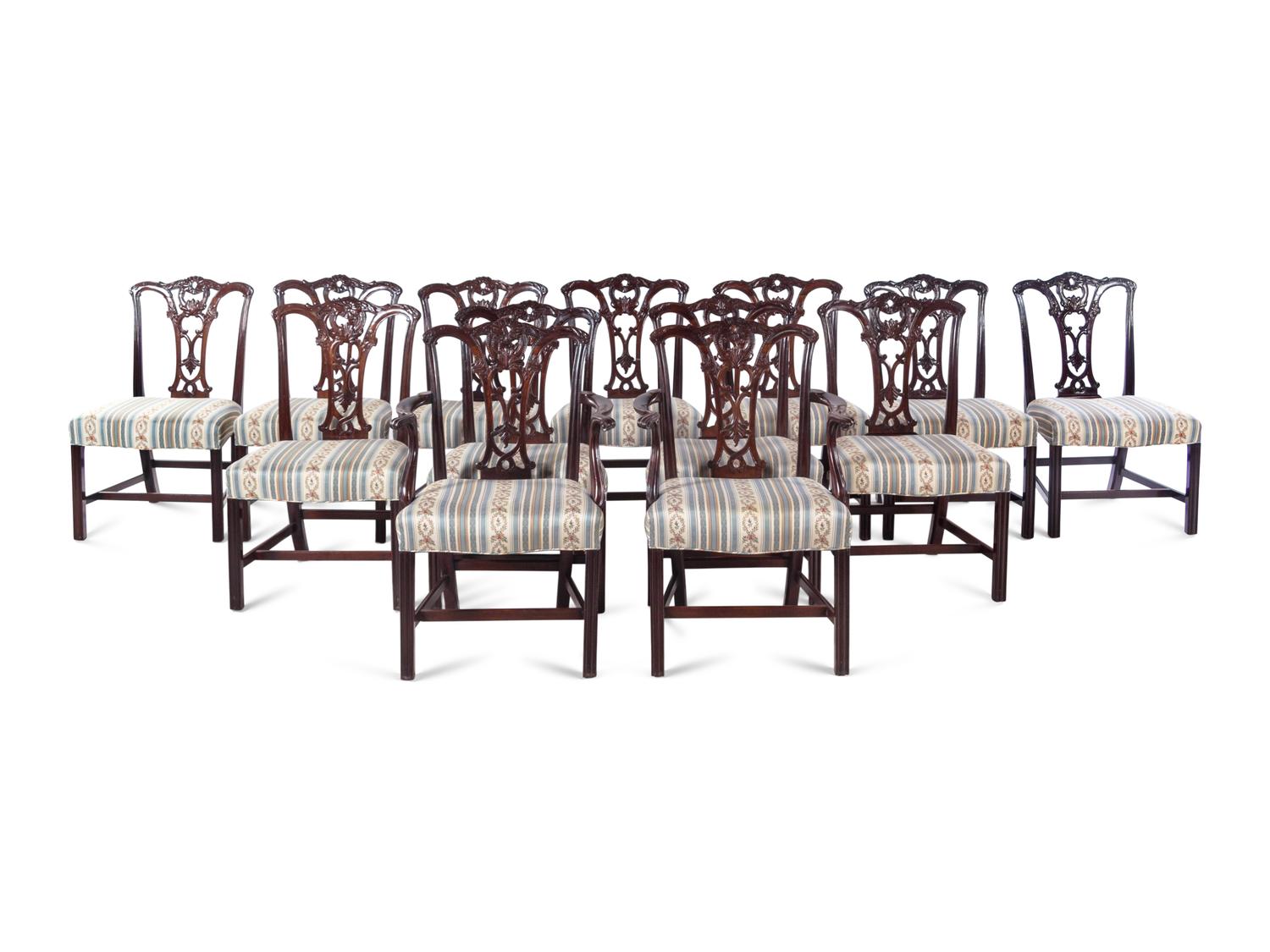 A Set of Fourteen George III Style Carved Mahogany Dining Chairs