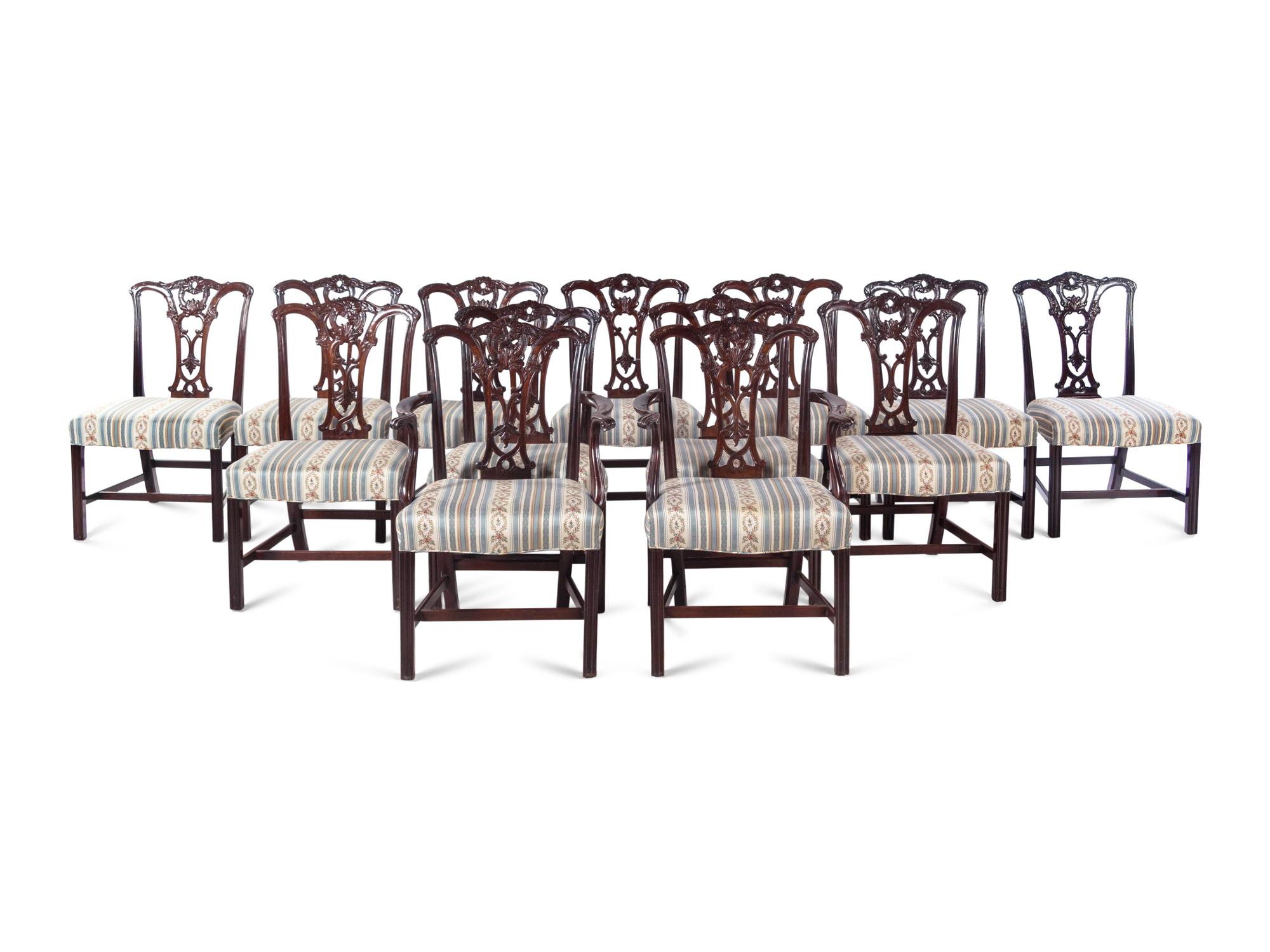 A Set of Fourteen George III Style Carved Mahogany Dining Chairs