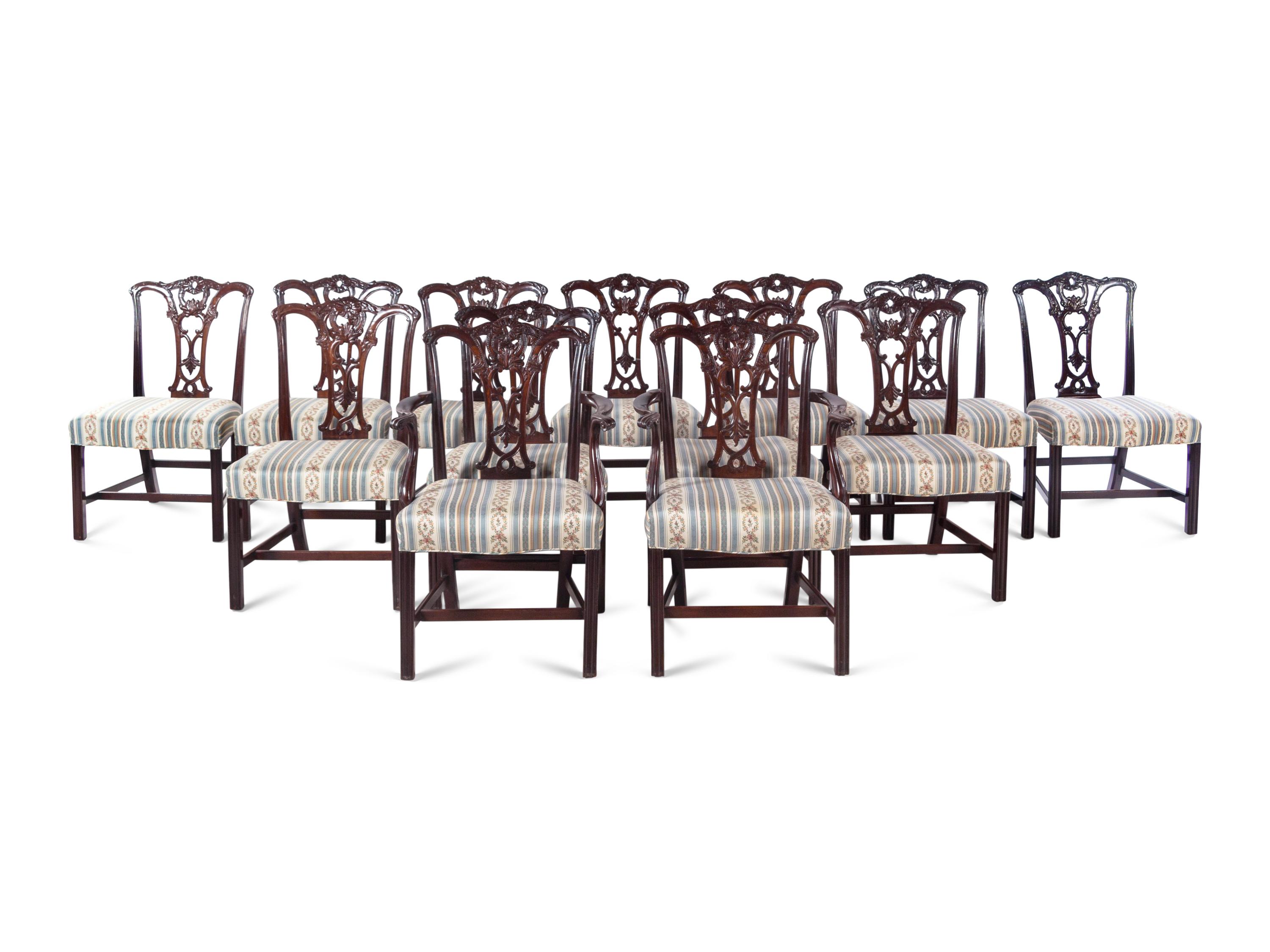 A Set of Fourteen George III Style Carved Mahogany Dining Chairs