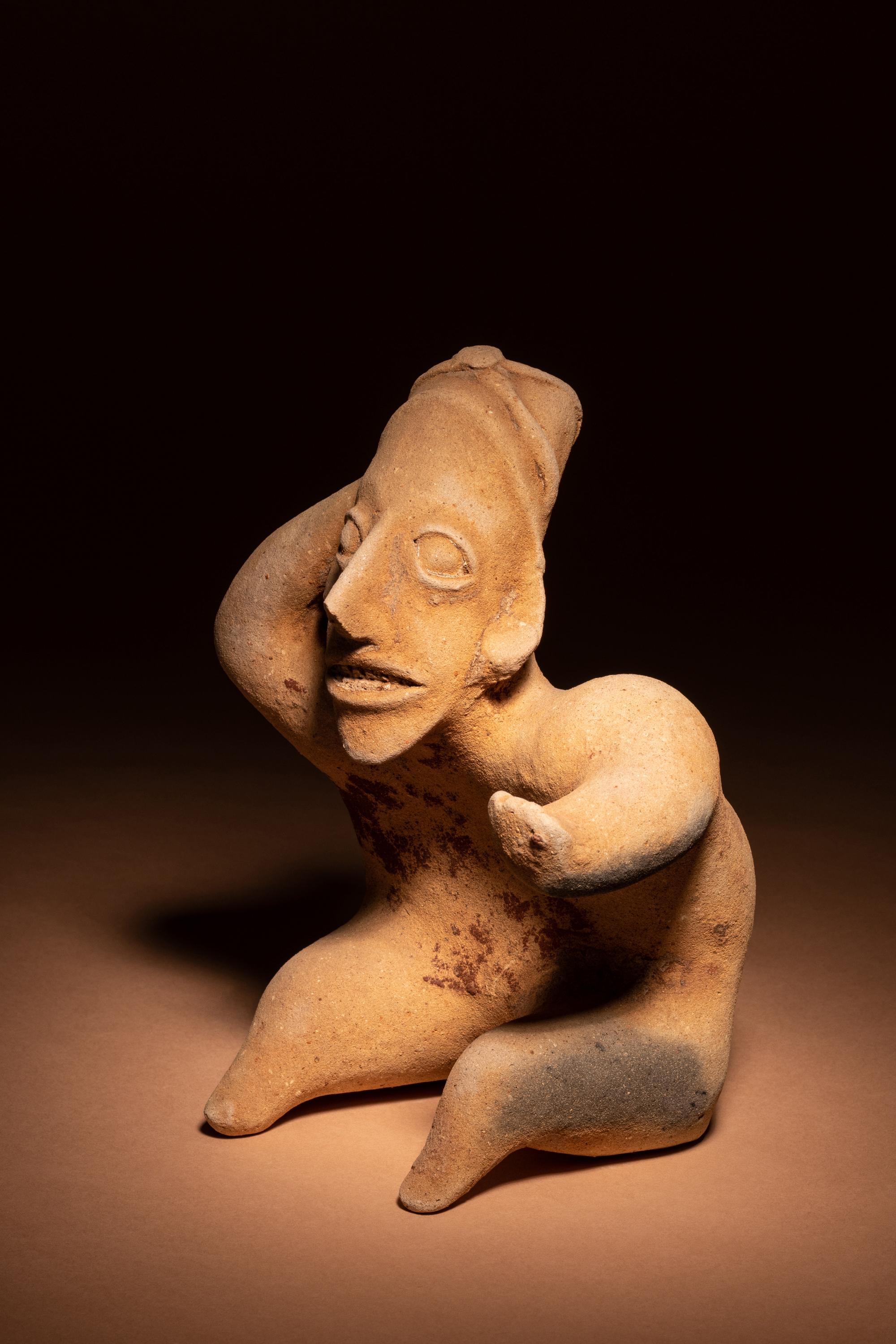 A Jalisco Terracotta Seated Figures