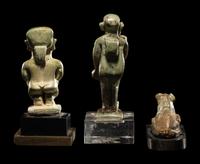 Three Egyptian Faience Amulets Including a Pataikos, a Harpocrates, and a Recumbent Lion