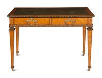 An English Gilt Bronze Mounted Satinwood Writing Table in the Louis XVI Taste