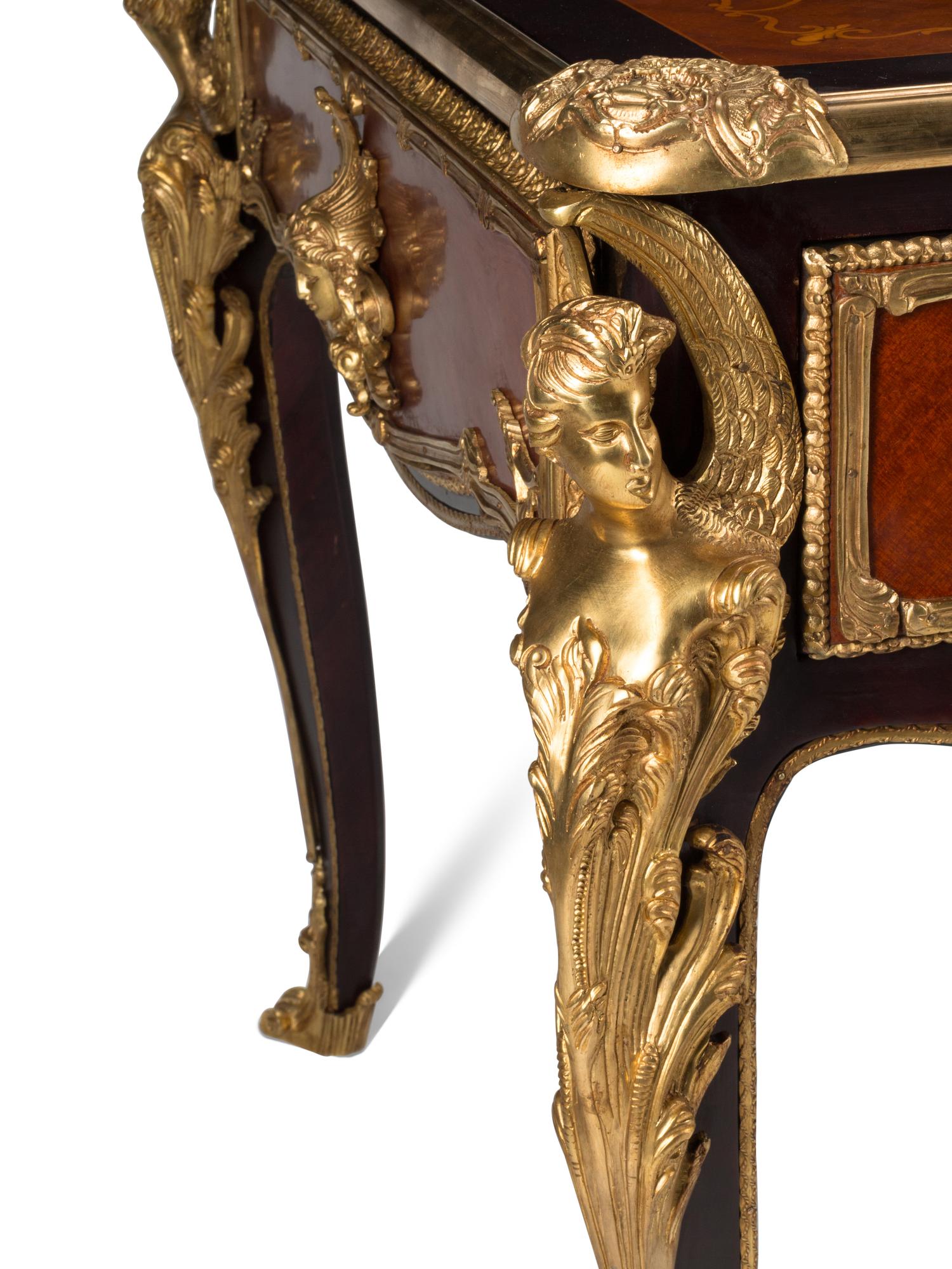 A Louis XV Style Gilt Bronze Mounted Marquetry Bureau Plat