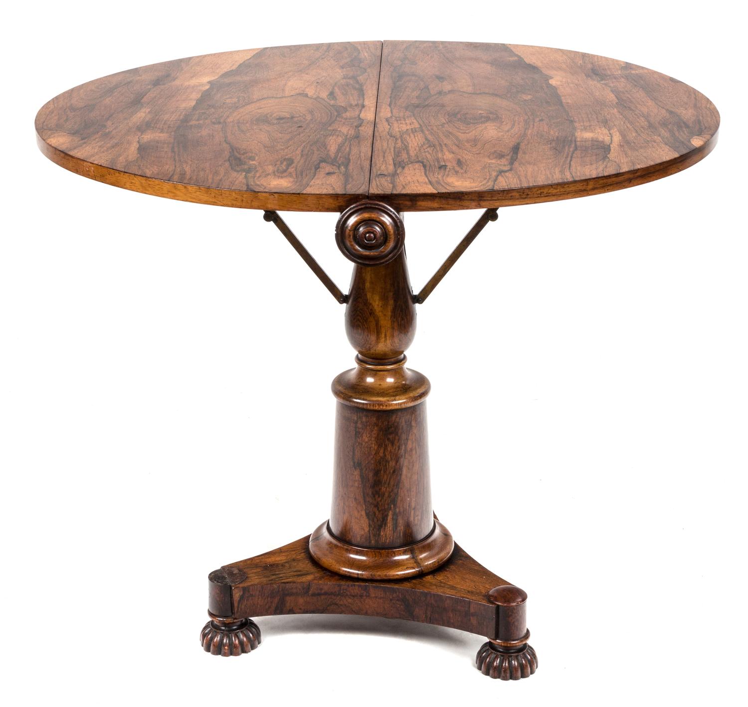 A Late Regency Rosewood Circular Side Table Height 28 1/4 x diameter 33 3/4 inches.