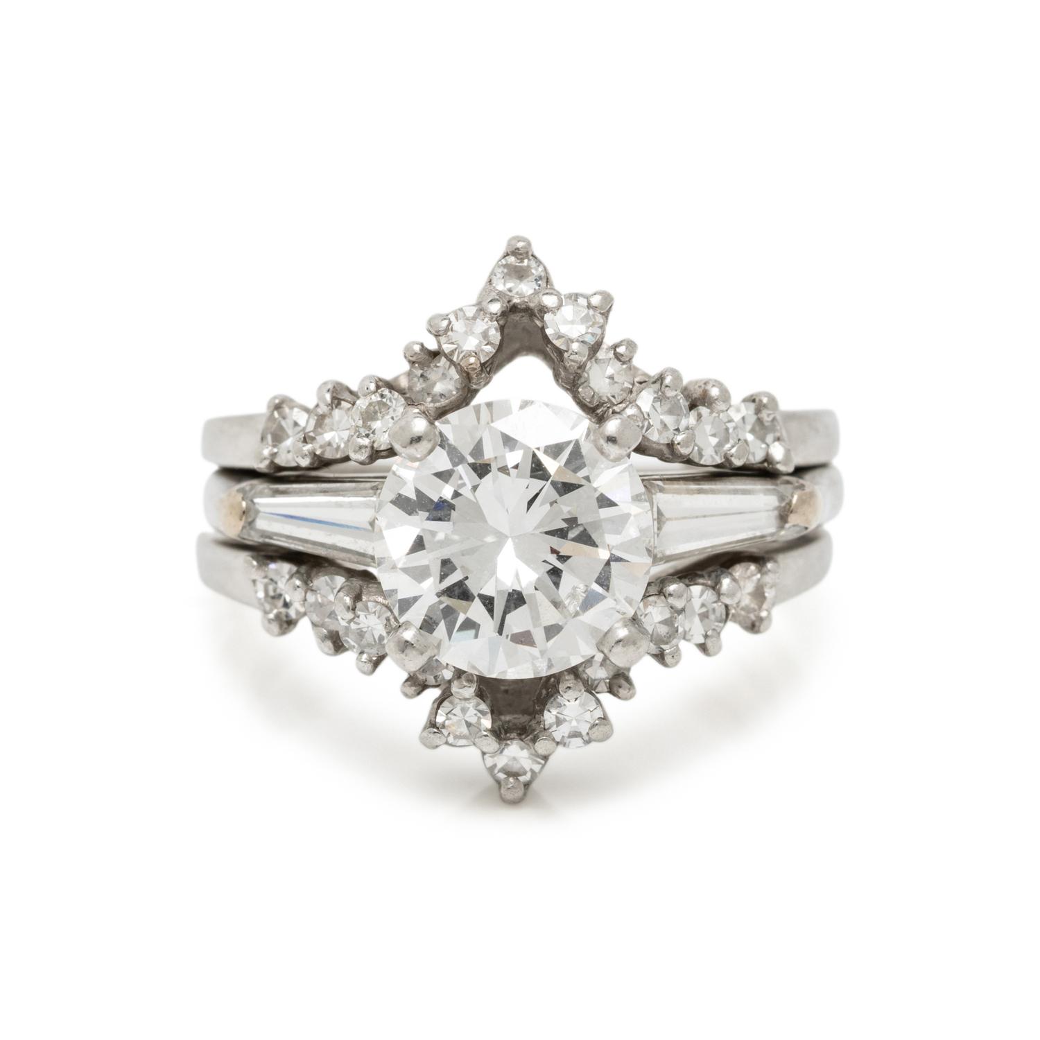 DIAMOND AND PLATINUM RING WITH JACKET