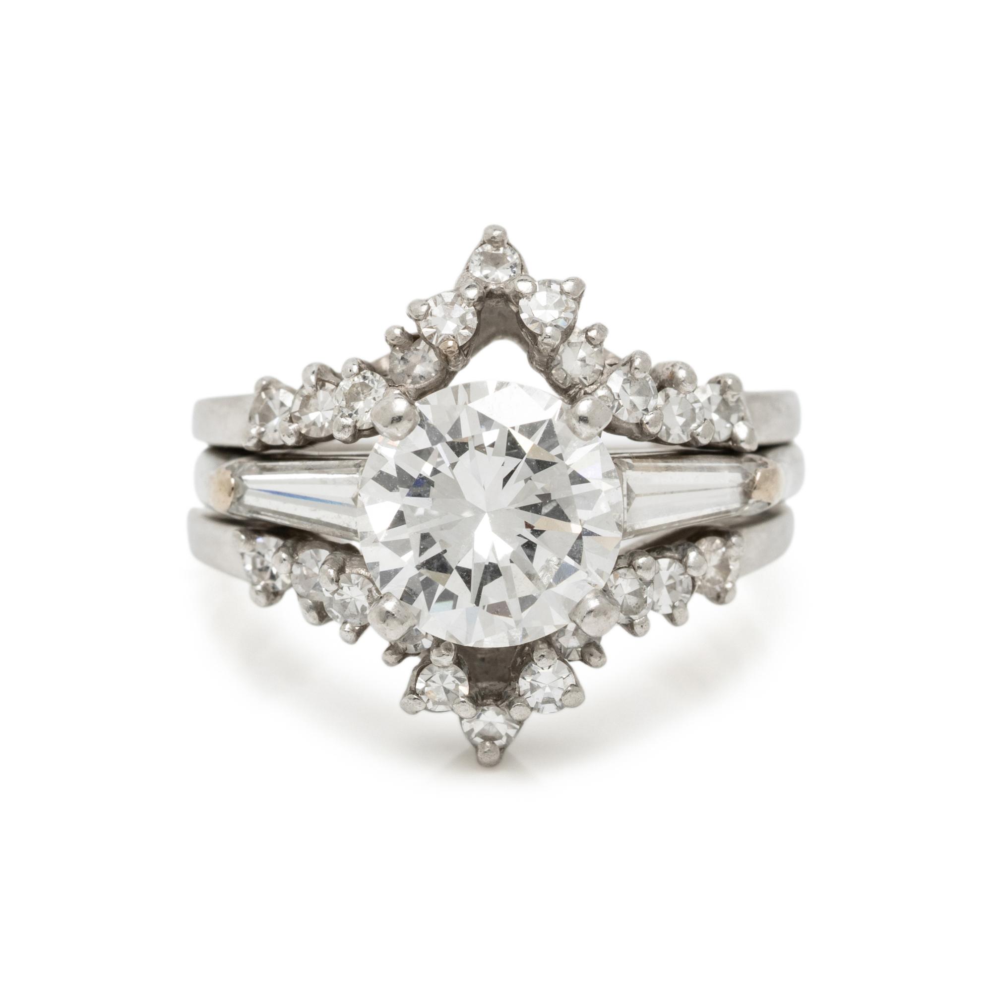 DIAMOND AND PLATINUM RING WITH JACKET
