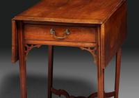 A Late Chippendale Carved Cherrywood Stretcher-Base Pembroke Table