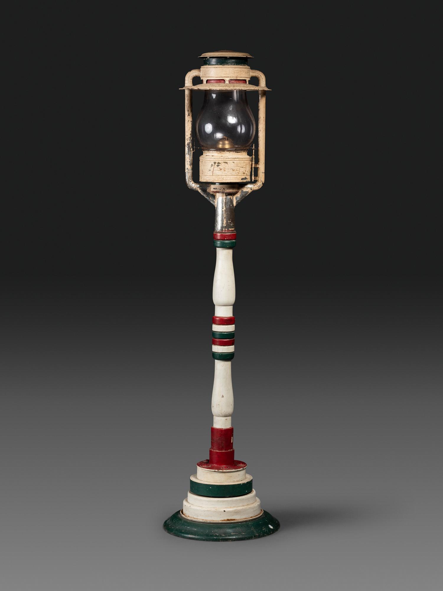 An American Painted Wood and Metal Stag Decorated Oil Lamppost