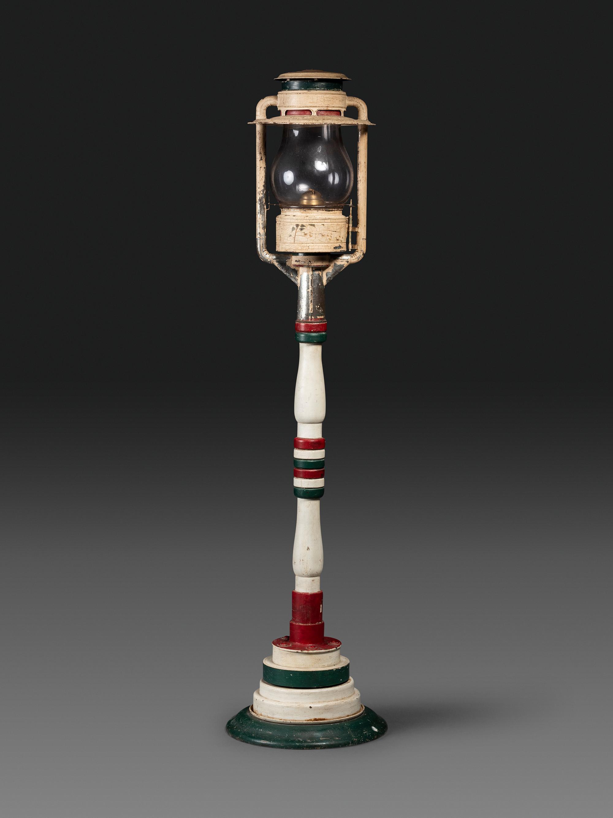 An American Painted Wood and Metal Stag Decorated Oil Lamppost