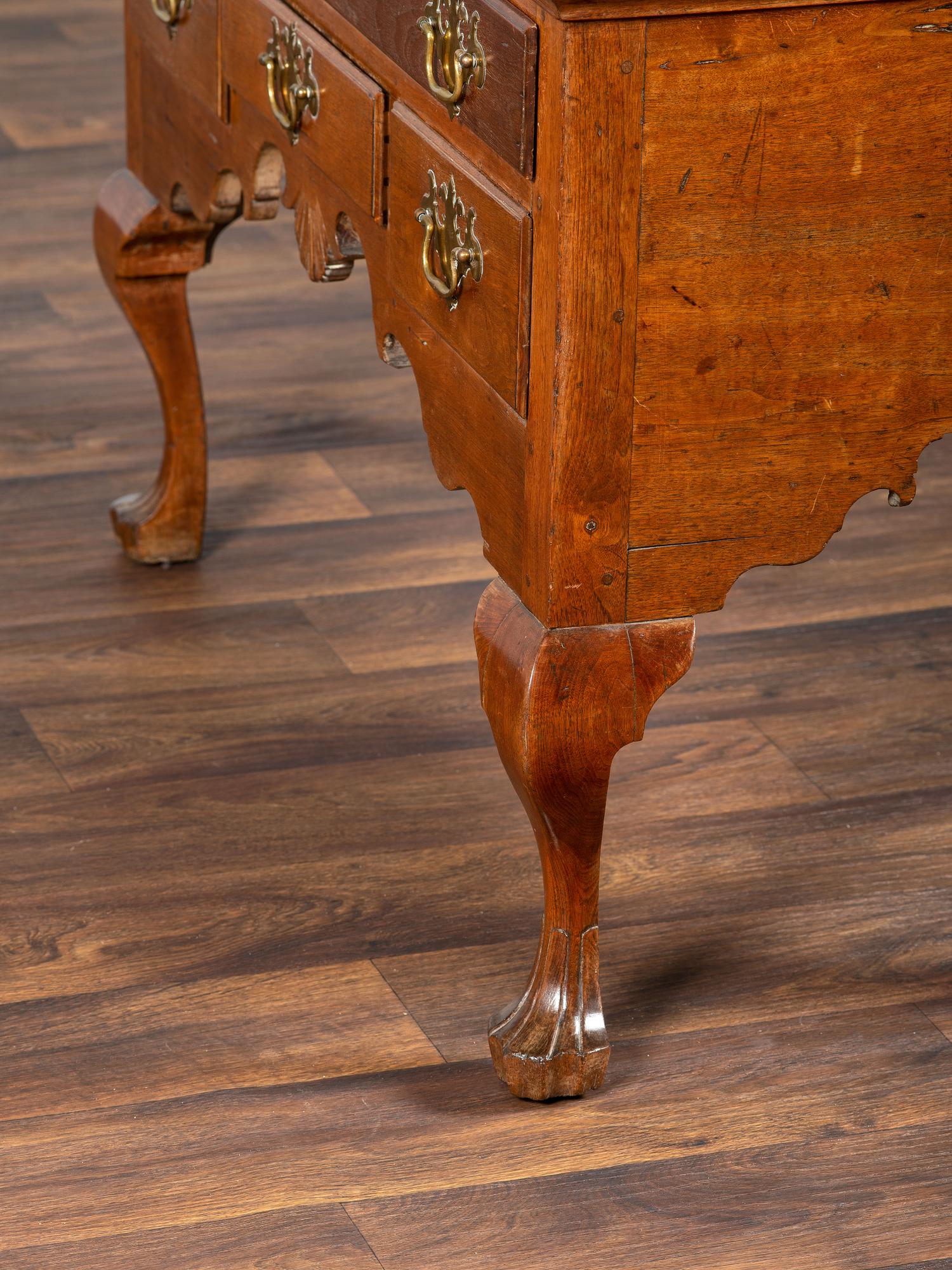 A Queen Anne Walnut Flat-Top High Chest