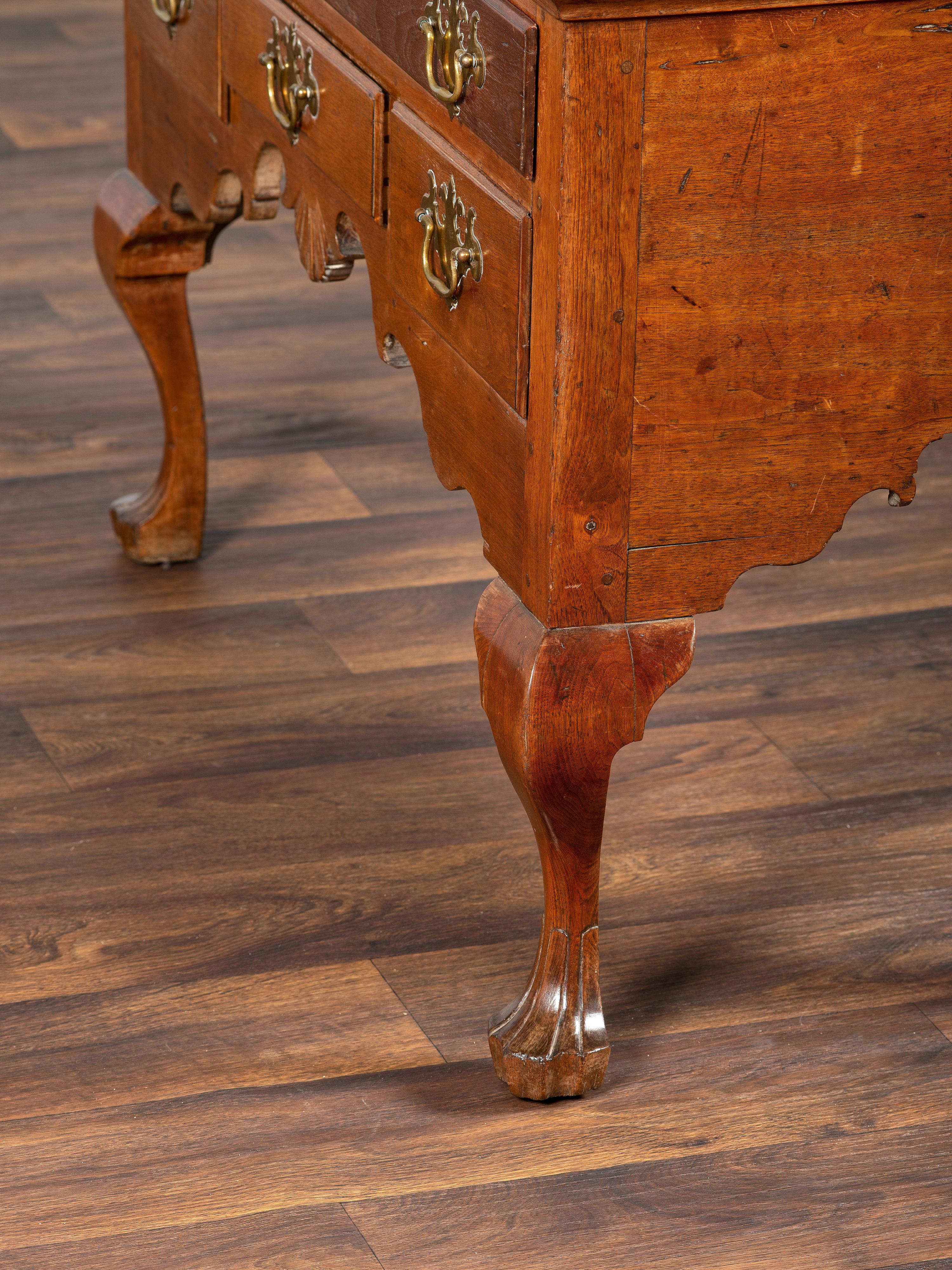 A Queen Anne Walnut Flat-Top High Chest
