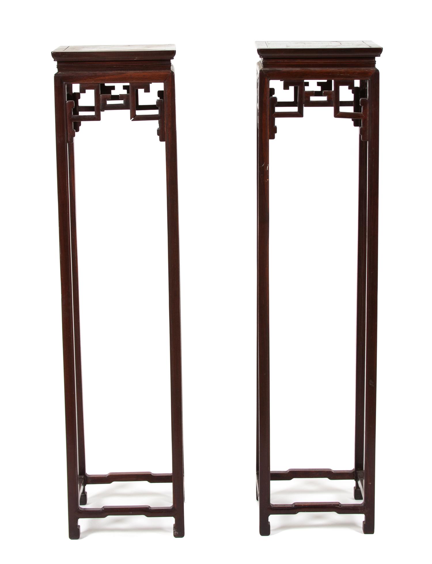 A Pair of Chinese Hardwood Stands Height 53 x width 13 x depth 13 inches. — 20TH CENTURY