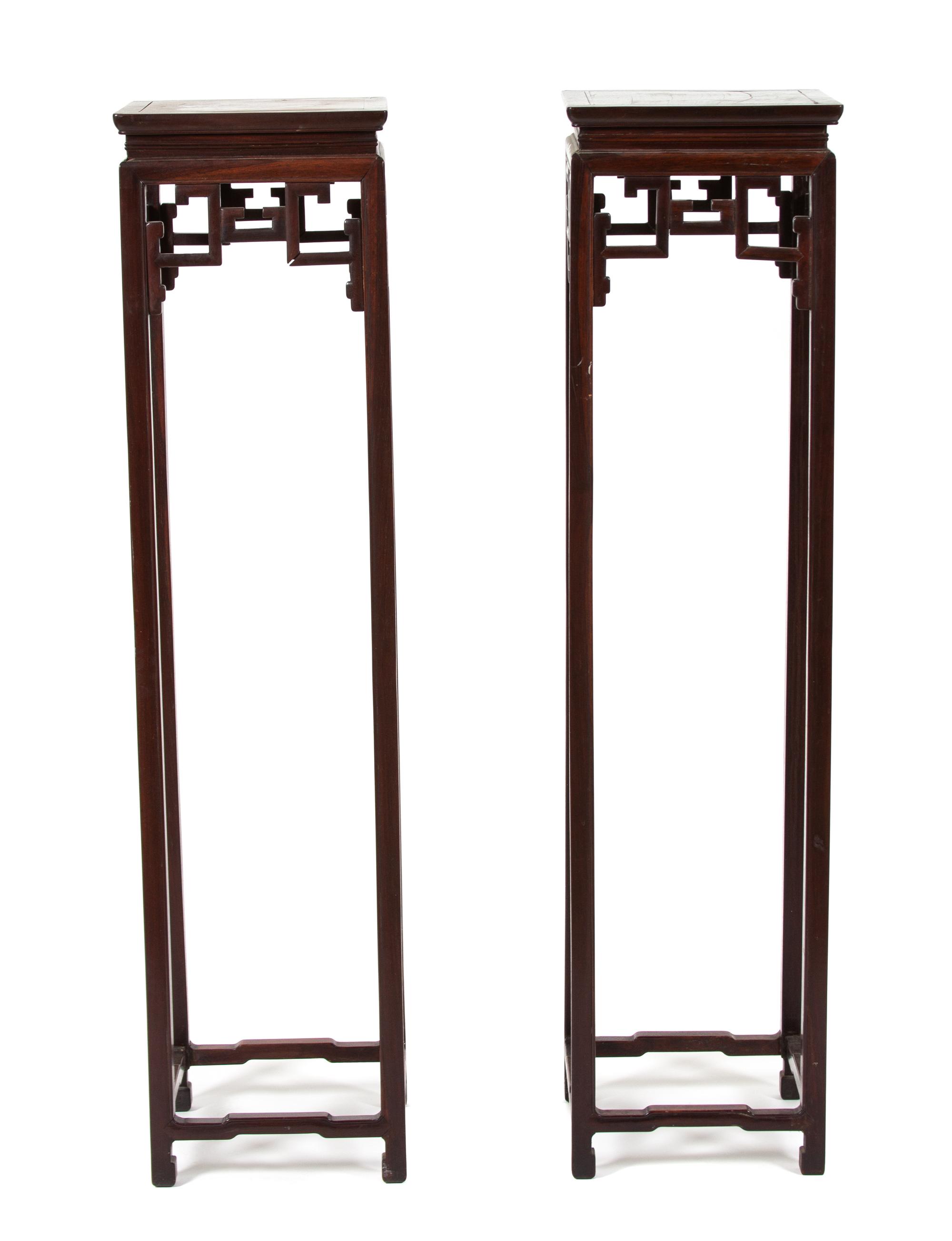 A Pair of Chinese Hardwood Stands Height 53 x width 13 x depth 13 inches. — 20TH CENTURY
