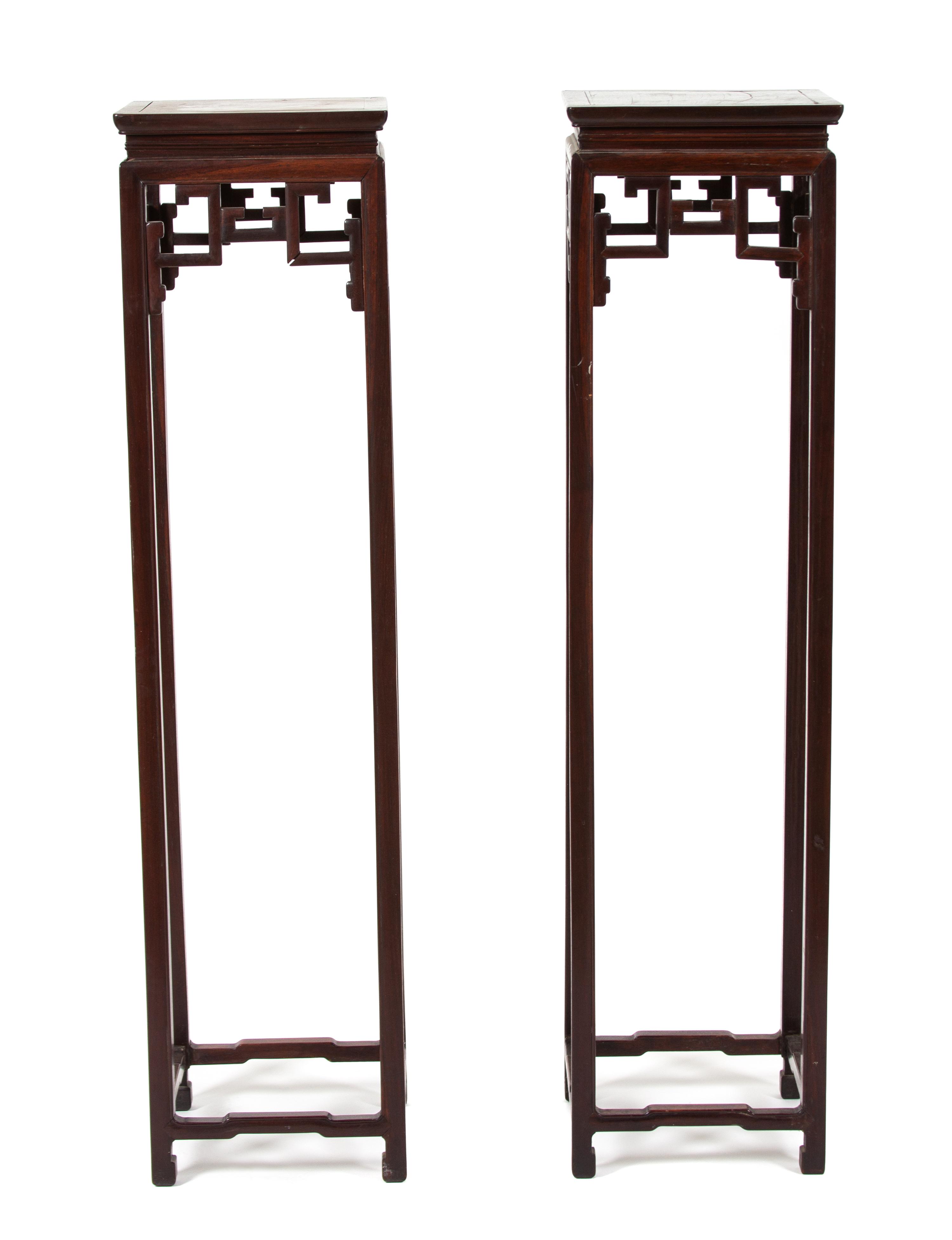 A Pair of Chinese Hardwood Stands Height 53 x width 13 x depth 13 inches. — 20TH CENTURY