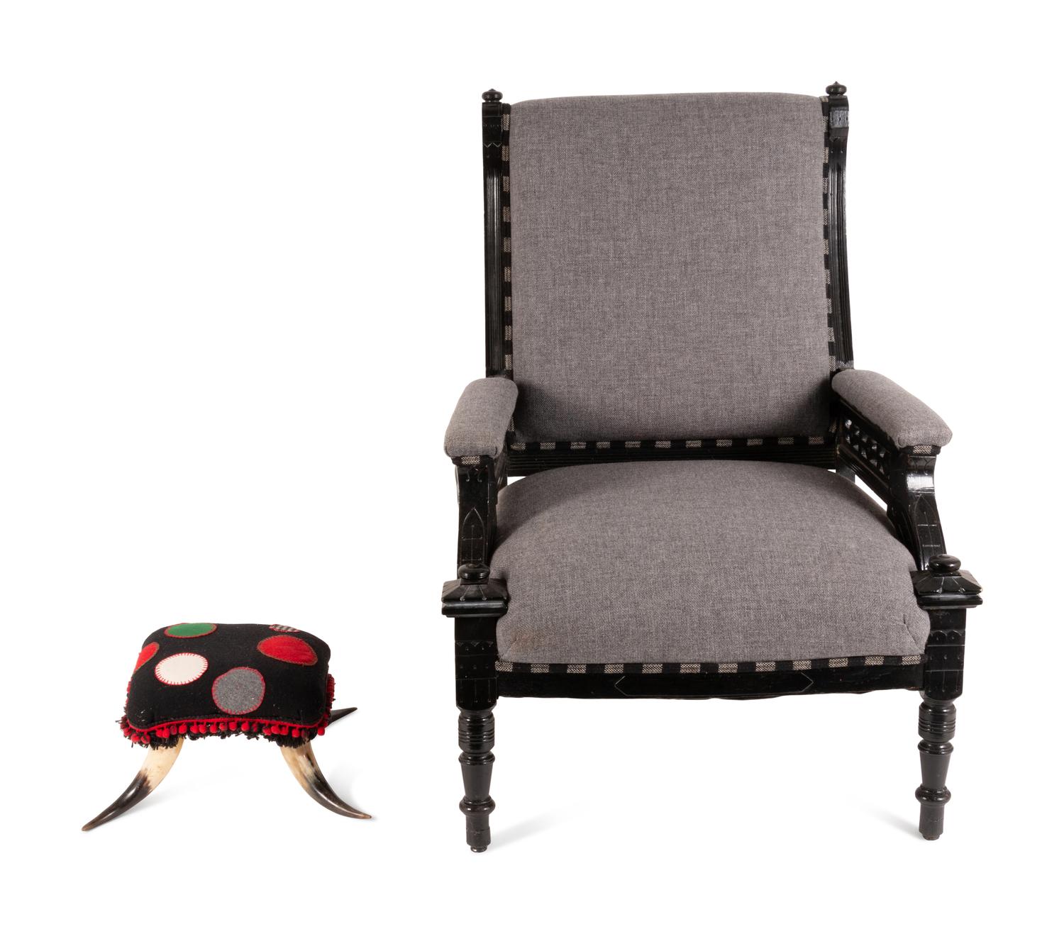 A Victorian Black Painted Armchair and Cow-Horn Footrest